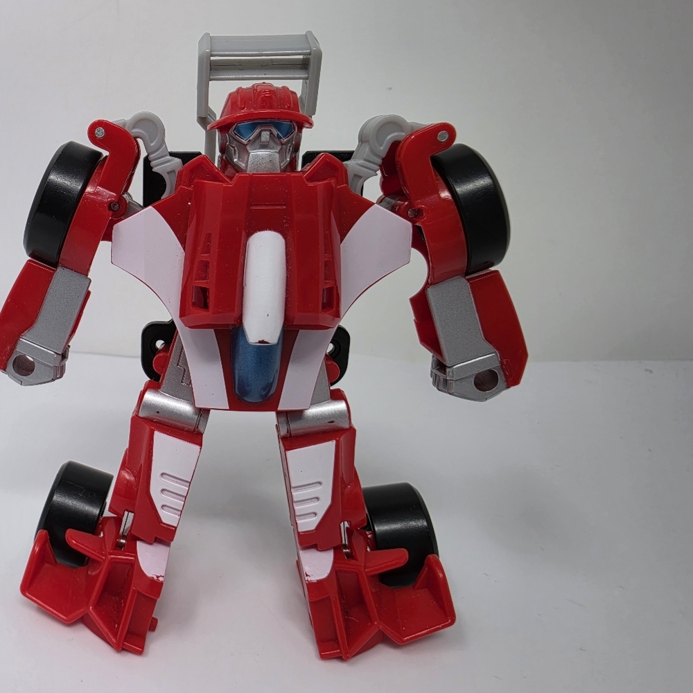 is a Transformers Rescue Bots Academy Heatwave Race Car Action Figure